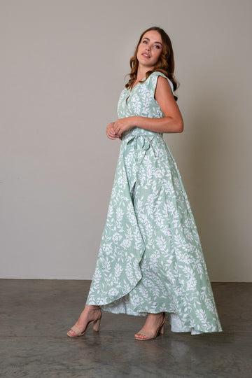 Maxi length wrap dress in a sage green with a waist tie and flattering silhouette